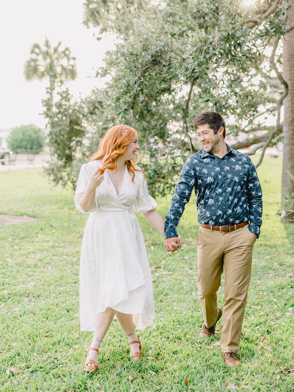 couple walking in the park at their engagement session