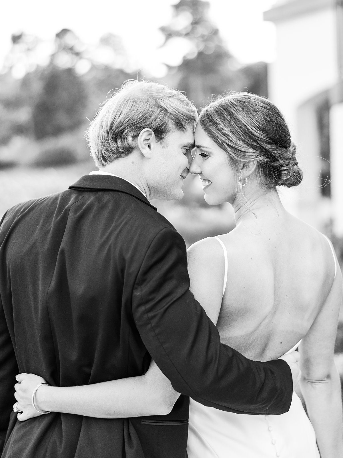 bride and groom intimate moment black and white image