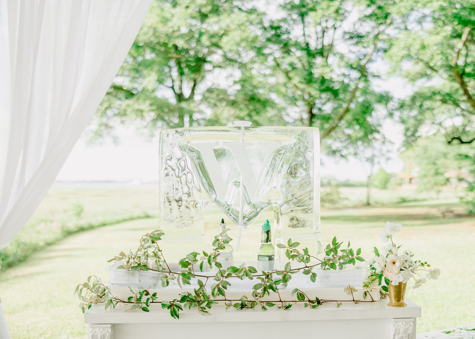 custom monogrammed ice drink station at Lowndes Grove wedding