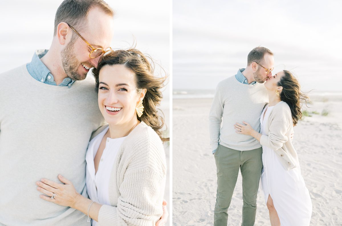 mom and dad share a kiss on the beach