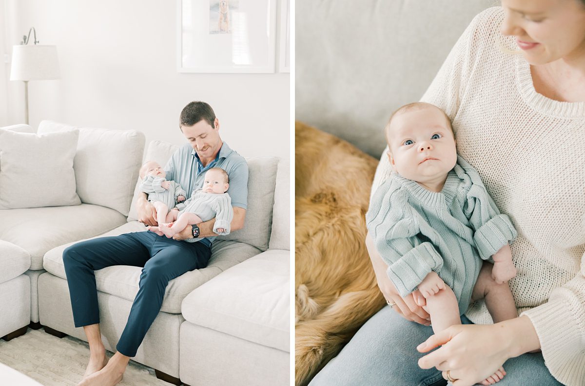 newborn baby girl looks at the camera with big blue eyes